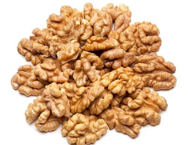 A walnut is the nut of any tree of the genus Juglans, particularly the Persian or English walnut, Juglans regia. A walnut is the edible seed of a drupe, and thus not a true botanical nut. It is commonly consumed as a nut.